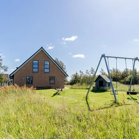 Den Gamle Smedje Ved Slettestrand Апартаменты Fjerritslev