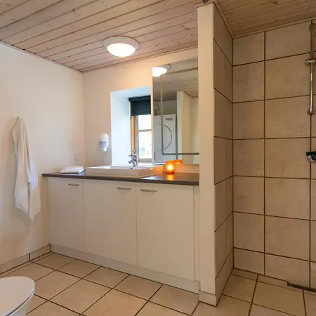 Den Gamle Smedje Ved Slettestrand Апартаменты Fjerritslev