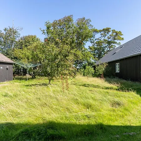 Den Gamle Smedje Ved Slettestrand Апартаменты Fjerritslev